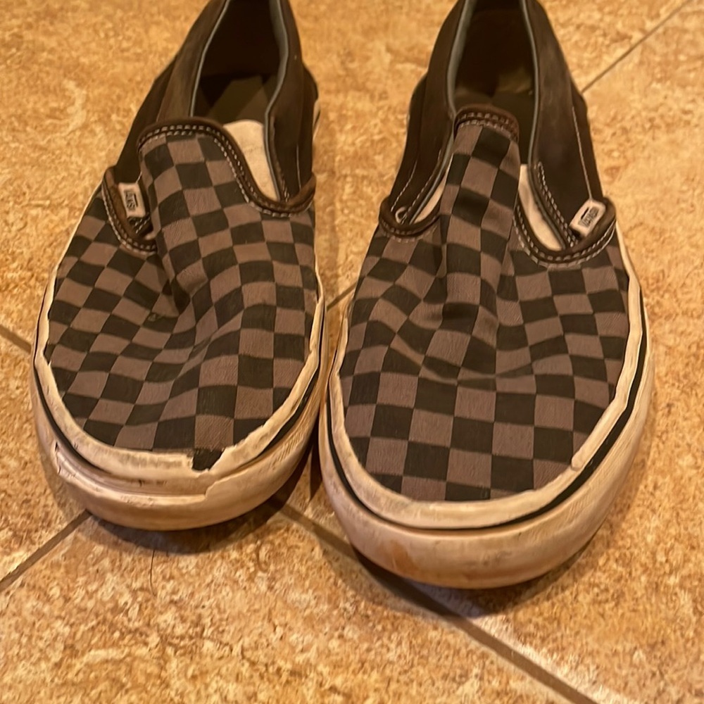 Vans , worn , a small pice missing from the front